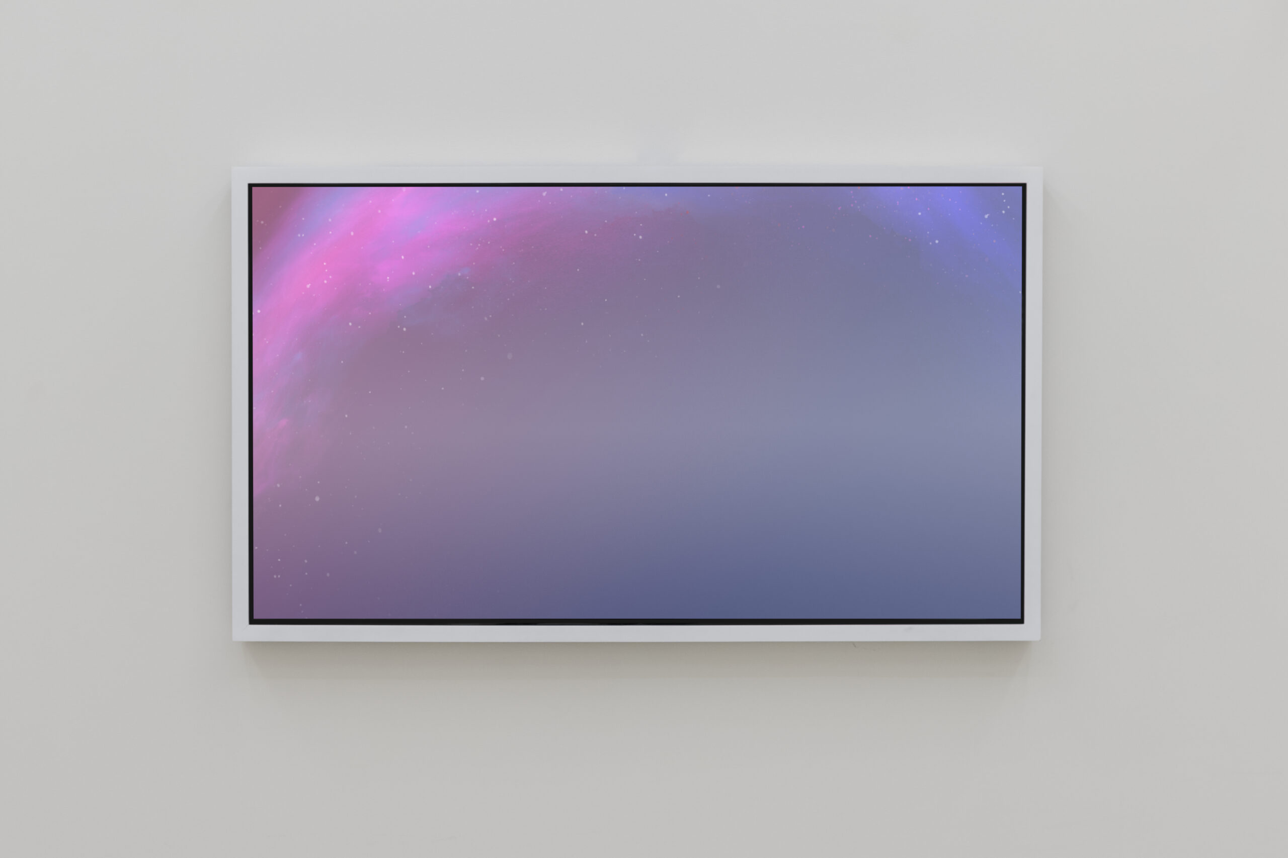 Interactive pink screen on wall in gallery